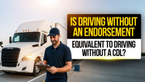 Smiling truck driver in a navy polo and cap holding a clipboard, standing in front of a white Freightliner semi-truck. Text overlay reads: "Is Driving Without an Endorsement Equivalent to Driving Without a CDL?"