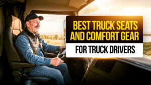 Truck driver sitting comfortably in a modern truck seat while driving at sunset, illustrating best truck seats and comfort gear for CDL drivers.