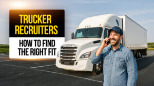 Smiling truck driver standing beside a white semi-truck while talking on the phone, representing trucker recruiters and how drivers can find the right company fit.